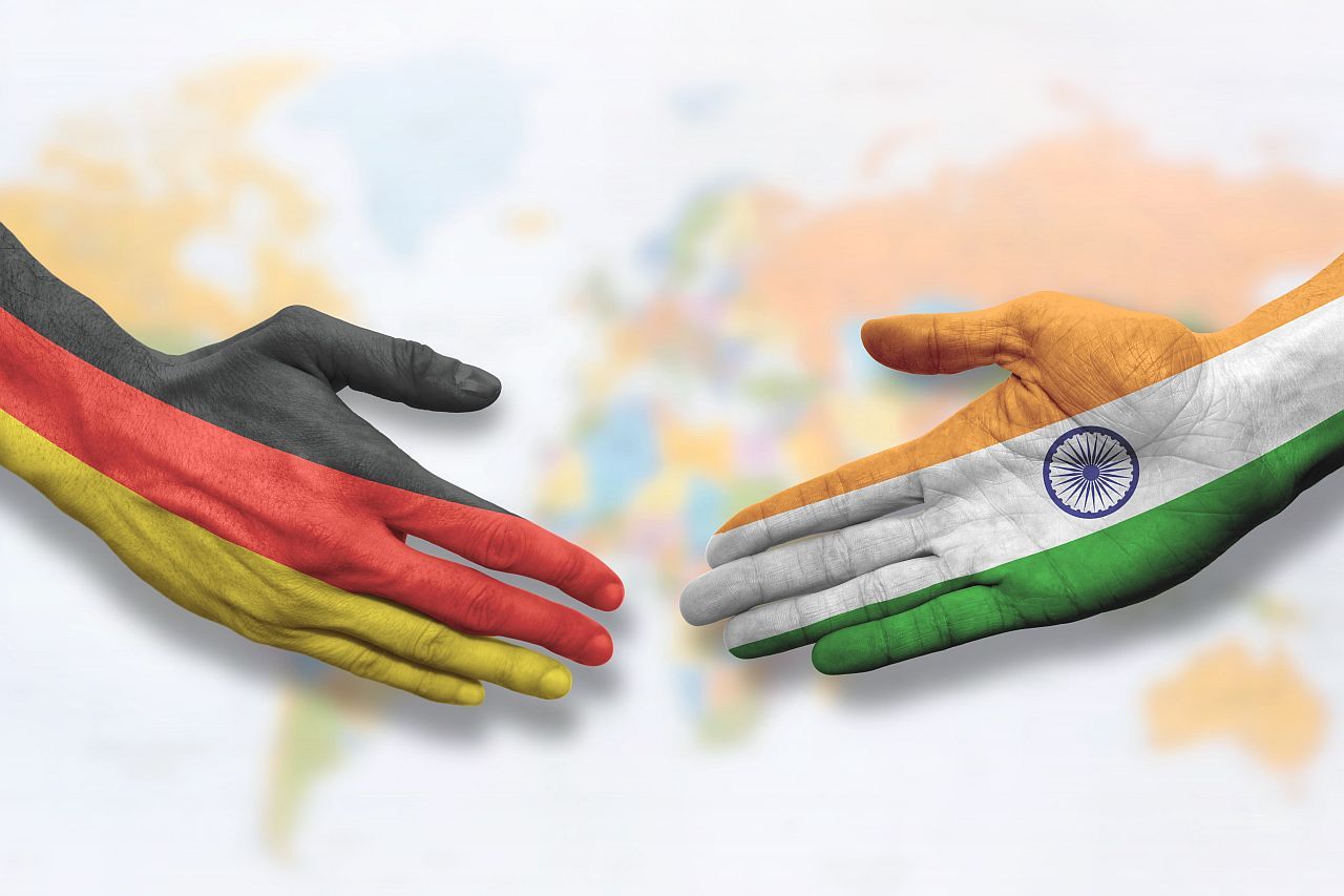 AdobeStock_407310379 India an Germany handshake_1920x1920.jpg